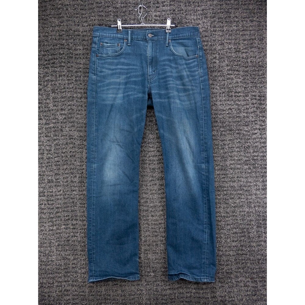 Levis 569 Jeans Mens 33x34 Actual 34x32 Blue Loose Fit Distressed Stretch Denim